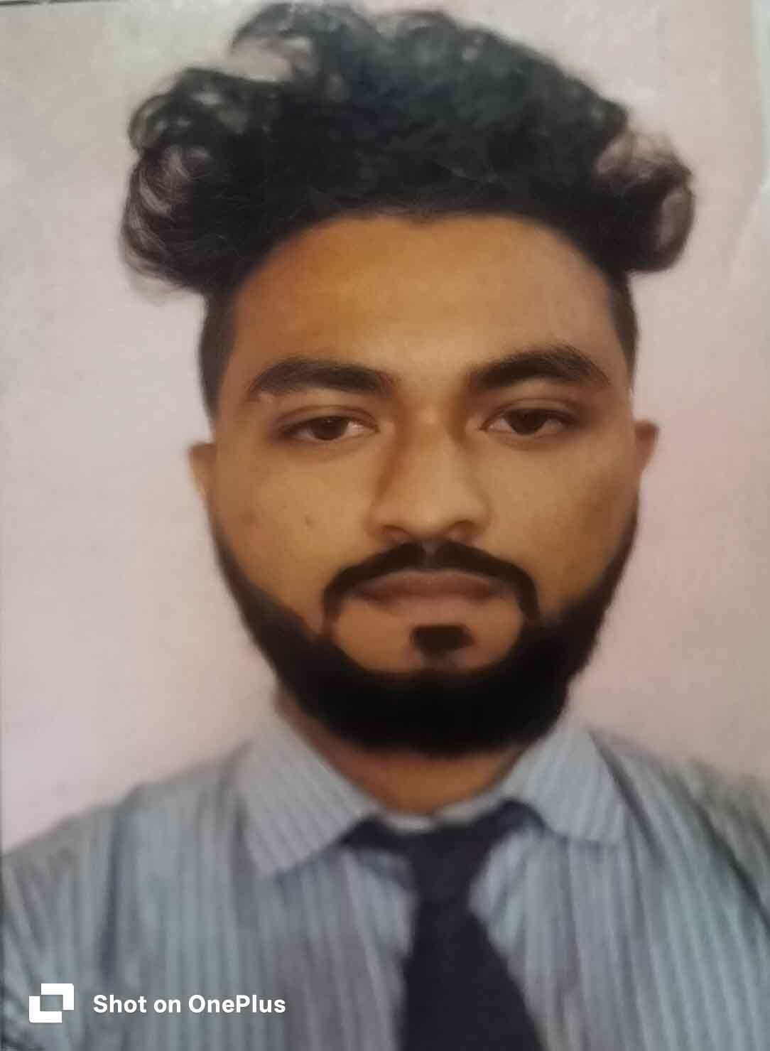 TANUJ PALLAV HAZARIKA